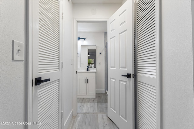 4890 Yew Ct, Titusville, FL 32796 - hall featuring light wood-type flooring
