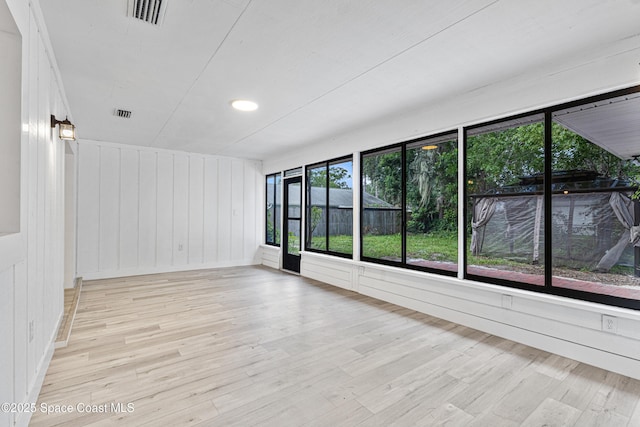 4890 Yew Ct, Titusville, FL 32796 - spare room featuring light wood finished floors