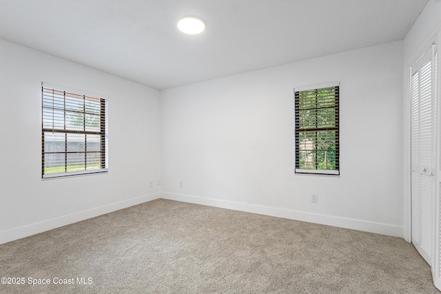 4890 Yew Ct, Titusville, FL 32796 - unfurnished bedroom with carpet floors and a closet
