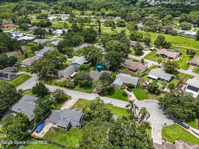 4890 Yew Ct, Titusville, FL 32796 - aerial overview of property's location with nearby suburban area