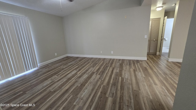 1820 Long Iron Dr Unit 525, Rockledge, FL 32955 - spare room with dark wood-type flooring and ceiling fan