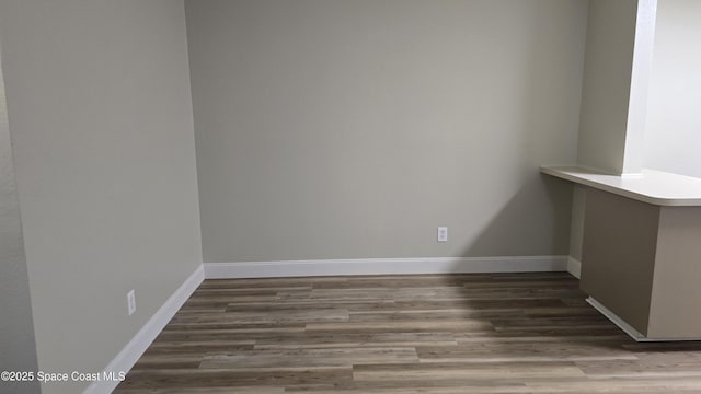 1820 Long Iron Dr Unit 525, Rockledge, FL 32955 - spare room with wood finished floors