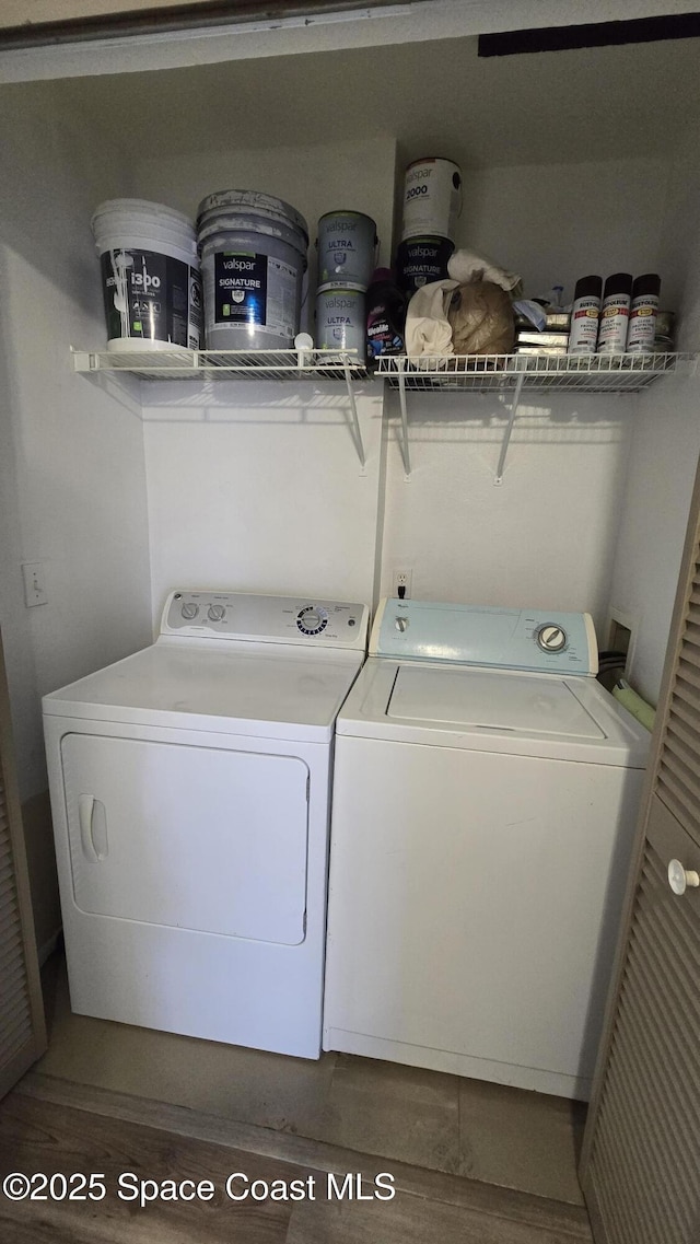 1820 Long Iron Dr Unit 525, Rockledge, FL 32955 - laundry room featuring washing machine and clothes dryer