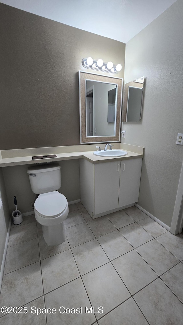 1820 Long Iron Dr Unit 525, Rockledge, FL 32955 - bathroom with vanity and tile patterned flooring