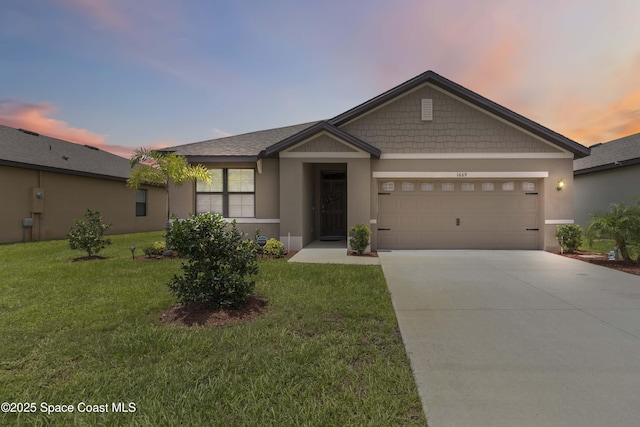 1669 Mineral Loop Dr NW, Palm Bay, FL 32907 - view of front of home featuring stucco siding, an attached garage, a front yard, and concrete driveway