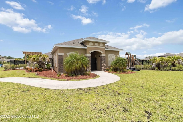 1669 Mineral Loop Dr NW, Palm Bay, FL 32907 - view of front of property featuring stone siding, a front lawn, and stucco siding