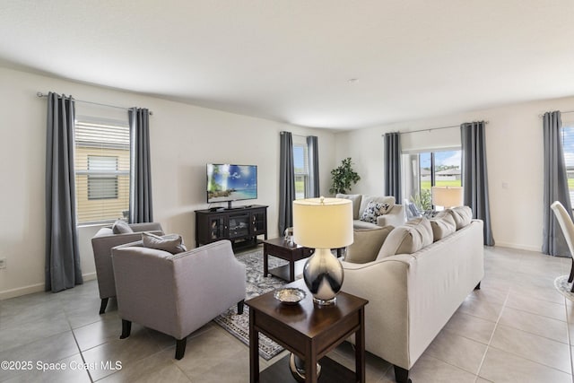 1669 Mineral Loop Dr NW, Palm Bay, FL 32907 - living area featuring healthy amount of natural light and light tile patterned floors