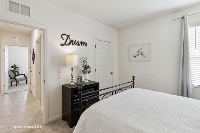 1669 Mineral Loop Dr NW, Palm Bay, FL 32907 - bedroom featuring baseboards and light tile patterned floors