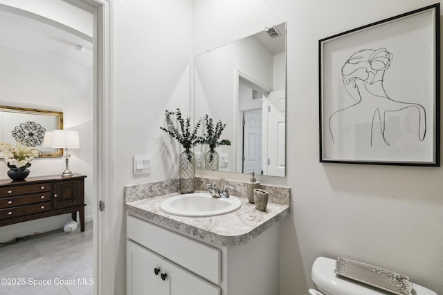 1669 Mineral Loop Dr NW, Palm Bay, FL 32907 - bathroom featuring vanity and toilet