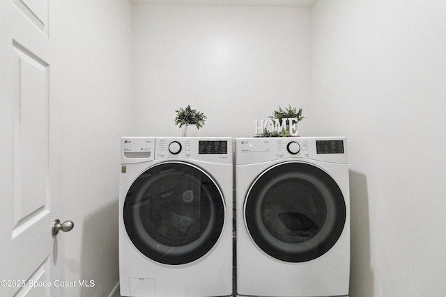 1669 Mineral Loop Dr NW, Palm Bay, FL 32907 - washroom featuring washer and dryer
