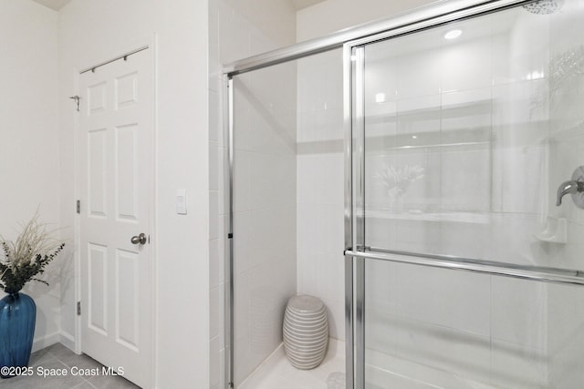 1669 Mineral Loop Dr NW, Palm Bay, FL 32907 - bathroom featuring a stall shower and tile patterned flooring