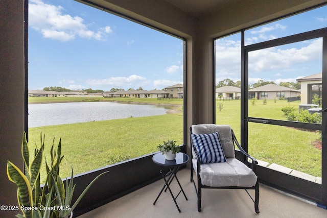 1669 Mineral Loop Dr NW, Palm Bay, FL 32907 - sunroom / solarium featuring a water view and a residential view