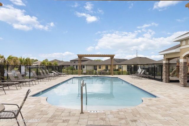 1669 Mineral Loop Dr NW, Palm Bay, FL 32907 - community pool featuring a residential view and a patio