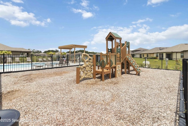 1669 Mineral Loop Dr NW, Palm Bay, FL 32907 - community playground featuring a community pool and a residential view