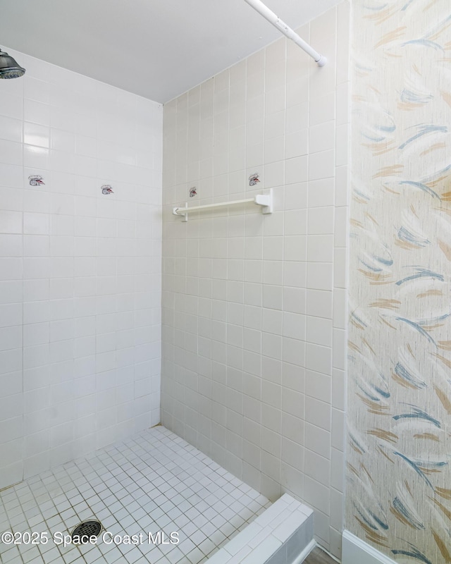 8496 Ridgewood Ave Unit 3205, Cape Canaveral, FL 32920 - bathroom with tiled shower
