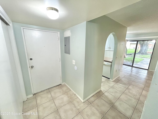 176 San Juan Cir, Melbourne, FL 32935 - foyer entrance featuring electric panel and light tile patterned floors