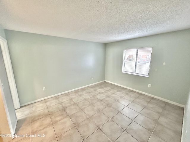 176 San Juan Cir, Melbourne, FL 32935 - spare room featuring a textured ceiling