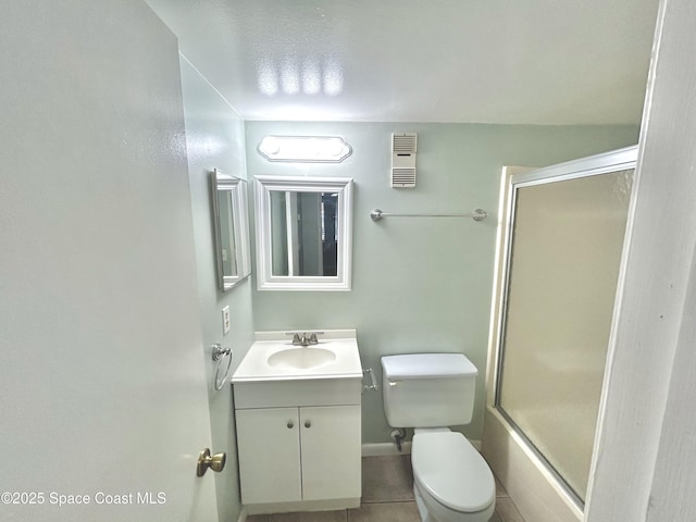 176 San Juan Cir, Melbourne, FL 32935 - bathroom featuring vanity, tile patterned floors, and enclosed tub / shower combo