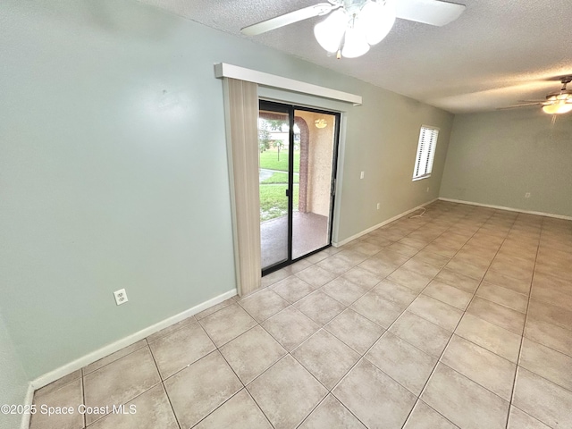 176 San Juan Cir, Melbourne, FL 32935 - empty room featuring a textured ceiling, a ceiling fan, and light tile patterned flooring