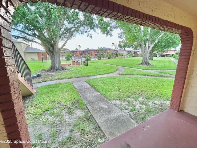 176 San Juan Cir, Melbourne, FL 32935 - view of grassy yard with a residential view