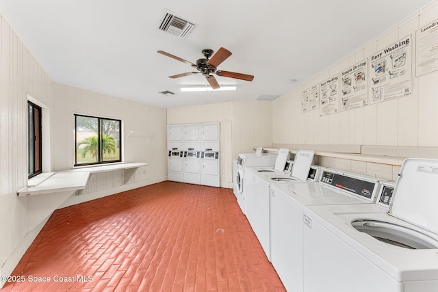 176 San Juan Cir, Melbourne, FL 32935 - shared laundry with washer and dryer, brick flooring, ceiling fan, and wood walls