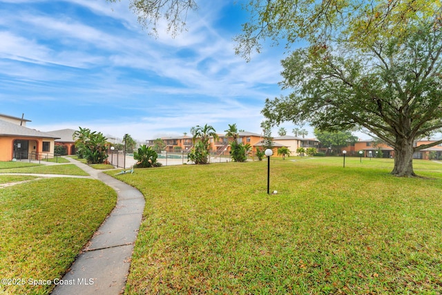 176 San Juan Cir, Melbourne, FL 32935 - view of yard featuring a residential view