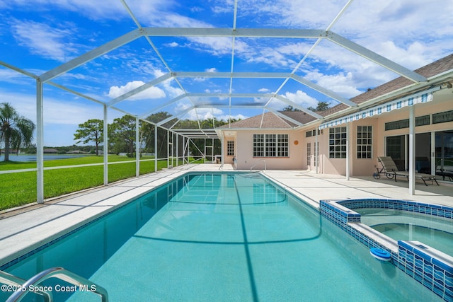 3912 Snowy Egret Dr, Melbourne, FL 32904 - view of pool featuring a patio area, a pool with connected hot tub, and glass enclosure