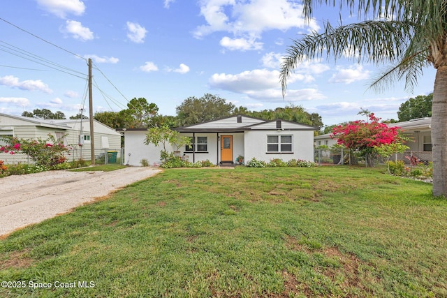 312 Tulip Ln, Melbourne, FL 32901 - single story home with stucco siding