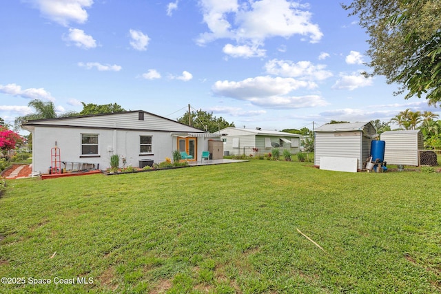 312 Tulip Ln, Melbourne, FL 32901 - back of property with a shed