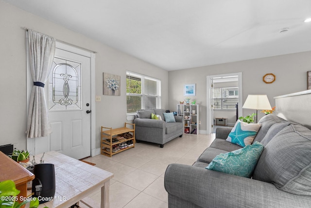 312 Tulip Ln, Melbourne, FL 32901 - living area featuring light tile patterned floors and baseboards