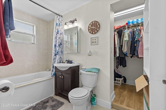 312 Tulip Ln, Melbourne, FL 32901 - bathroom with vanity, shower / bath combo with shower curtain, and wood finished floors