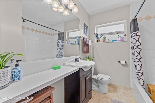 312 Tulip Ln, Melbourne, FL 32901 - full bathroom with vanity, tile patterned flooring, and shower / bath combo with shower curtain