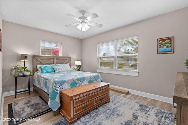 312 Tulip Ln, Melbourne, FL 32901 - bedroom featuring wood finished floors and ceiling fan