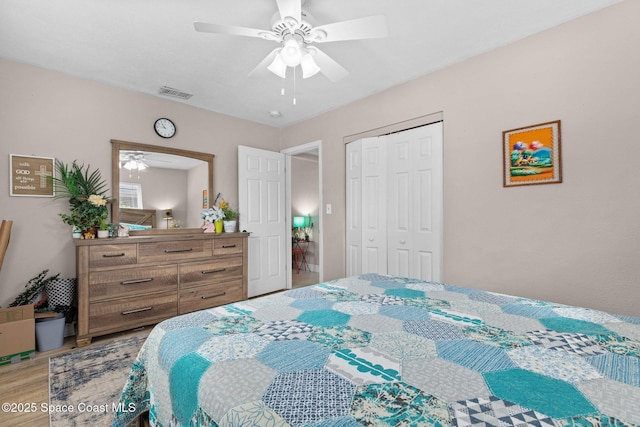 312 Tulip Ln, Melbourne, FL 32901 - bedroom with light wood-style flooring, a closet, and ceiling fan