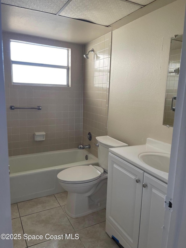 725 Port Malabar Blvd NE, Palm Bay, FL 32905 - bathroom featuring vanity, tile patterned flooring, and tub / shower combination