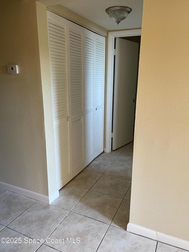 725 Port Malabar Blvd NE, Palm Bay, FL 32905 - corridor with light tile patterned flooring