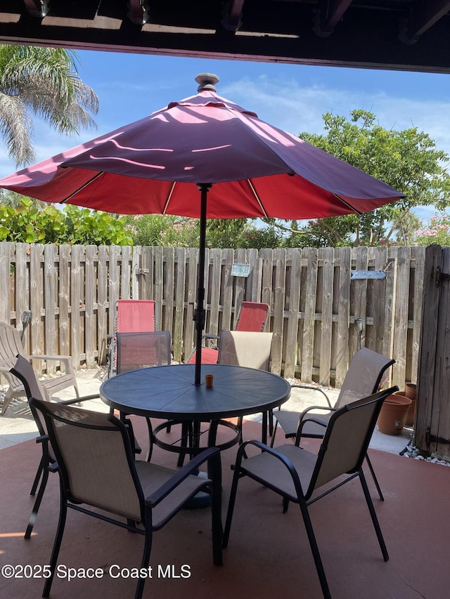 3343 Sandy Reef Ct, Melbourne Beach, FL 32951 - view of patio / terrace with outdoor dining area