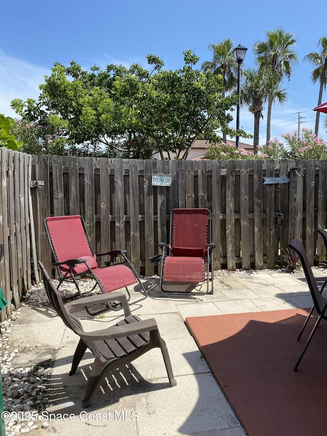 3343 Sandy Reef Ct, Melbourne Beach, FL 32951 - view of patio / terrace