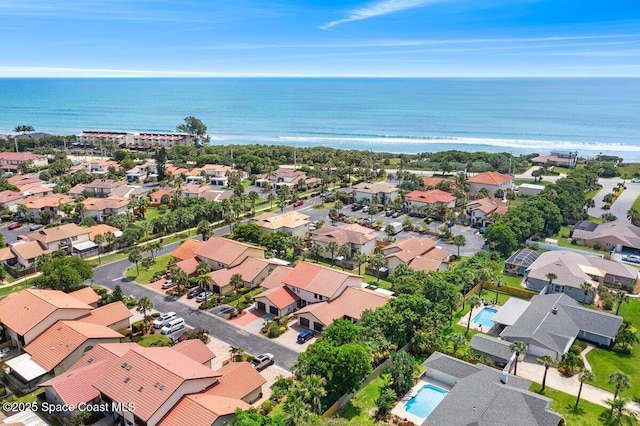 3343 Sandy Reef Ct, Melbourne Beach, FL 32951 - aerial view of residential area with a large body of water and a pool area