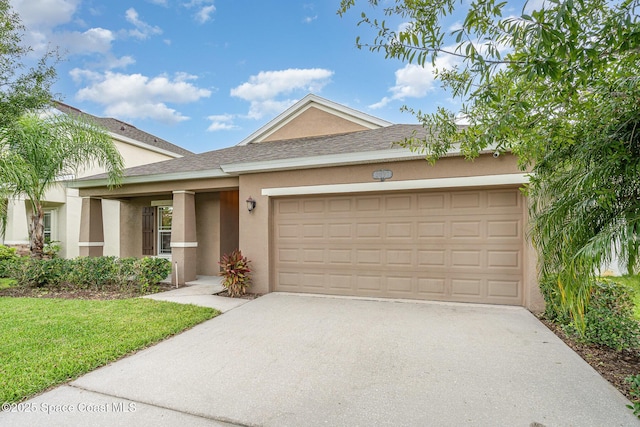 2097 Attilburgh Blvd, Melbourne, FL 32904 - ranch-style house featuring driveway, stucco siding, roof with shingles, and a front lawn