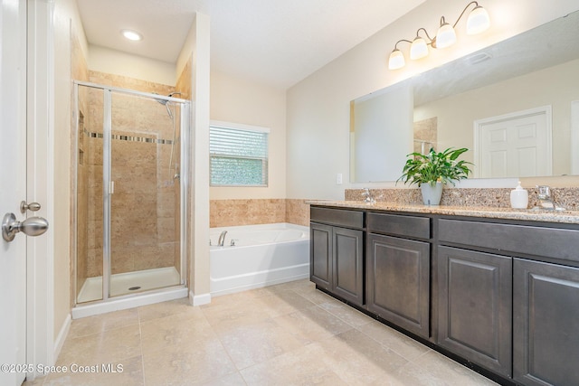 2097 Attilburgh Blvd, Melbourne, FL 32904 - full bathroom with double vanity, a garden tub, a stall shower, and tile patterned floors