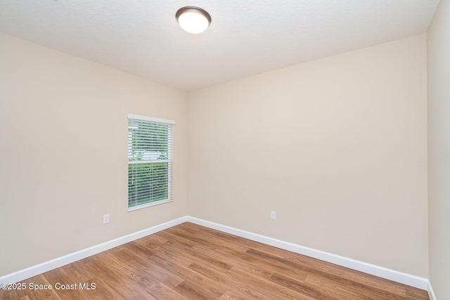 2097 Attilburgh Blvd, Melbourne, FL 32904 - empty room featuring baseboards and light wood-style floors