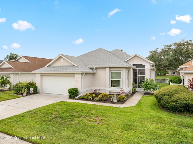 2596 Addington Cir, Rockledge, FL 32955 - view of front of property with a garage, stucco siding, concrete driveway, a front lawn, and roof with shingles
