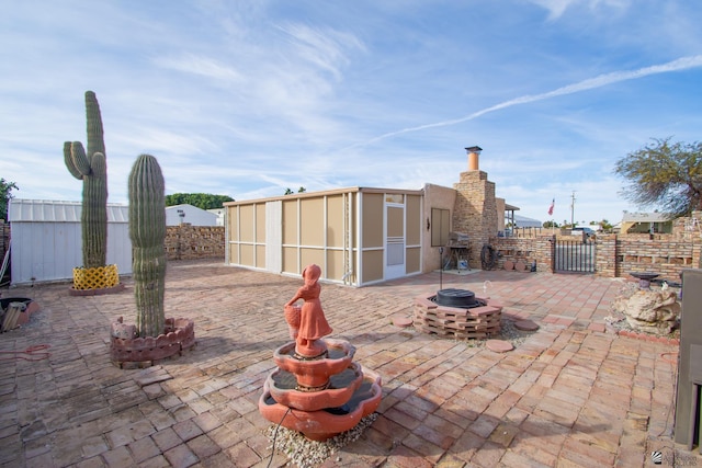 view of patio / terrace with a sunroom