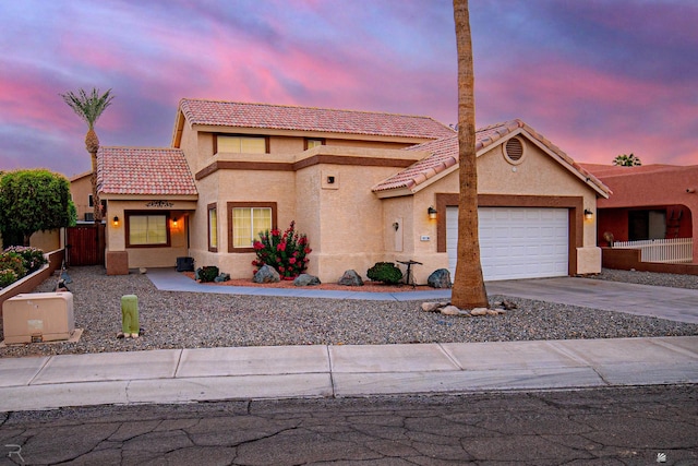 view of front of home with a garage