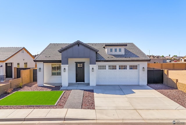 view of front of property with a garage