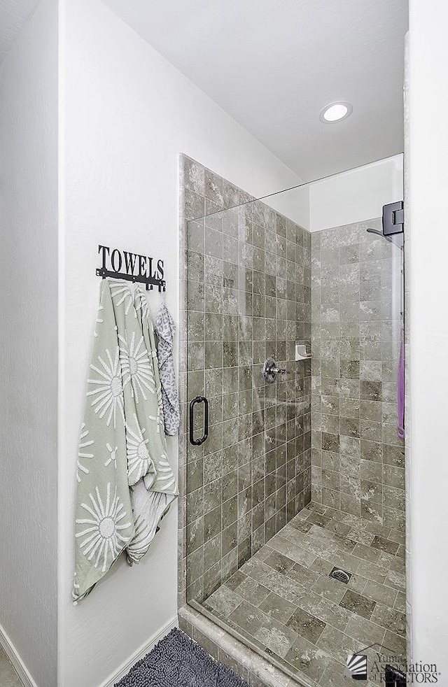 bathroom featuring a stall shower