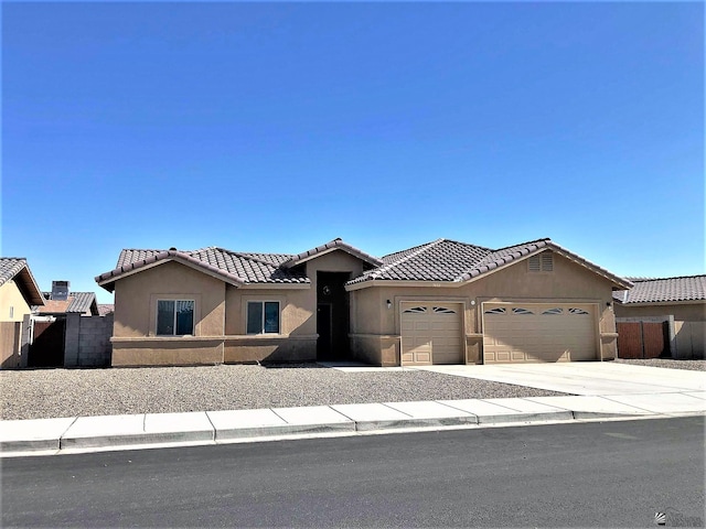 view of front of property with a garage