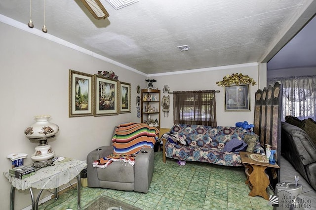 living room featuring ceiling fan and a textured ceiling