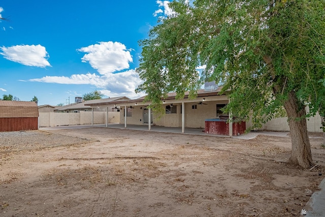 back of property featuring a patio area